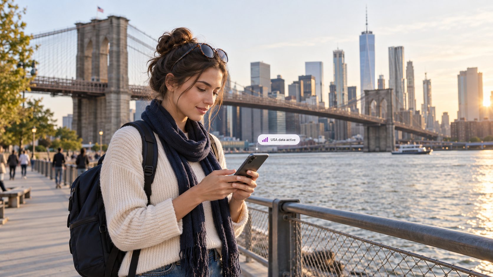 Traveler using a smartphone in New York with a USA eSIM for mobile data abroad