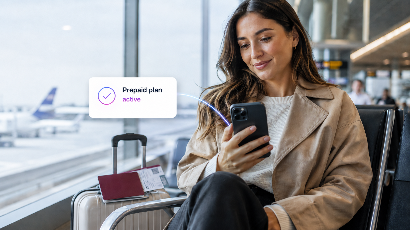 Traveler using a smartphone with a prepaid eSIM plan before using mobile data abroad