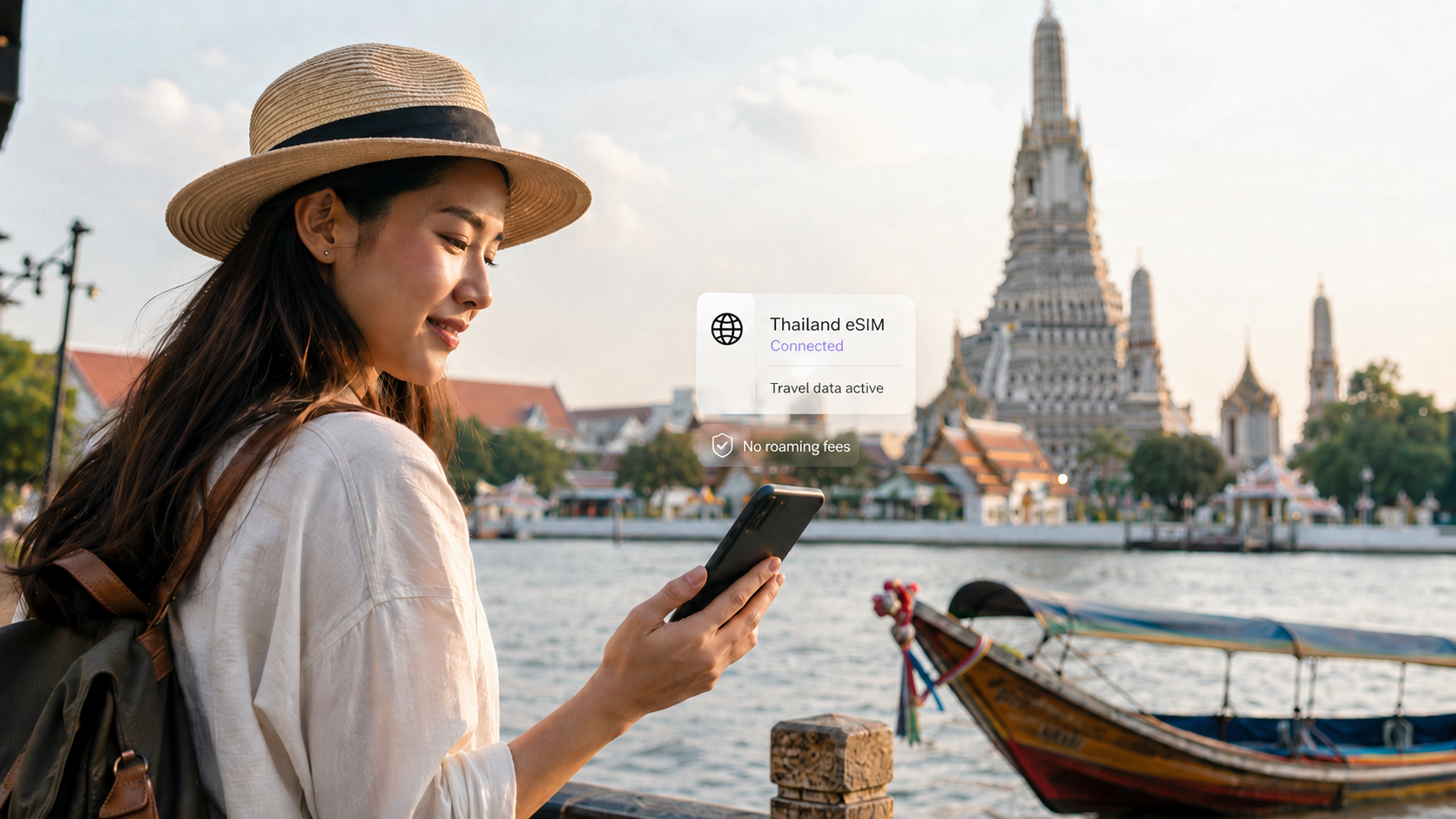 Traveler using a smartphone with a Thailand eSIM for internet access without roaming